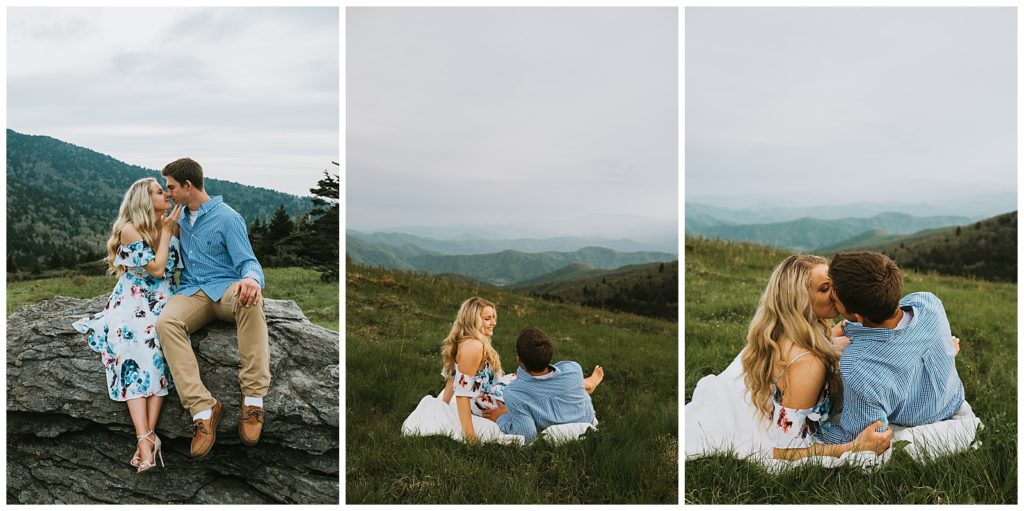 couple cuddling on a blanket in the mountains