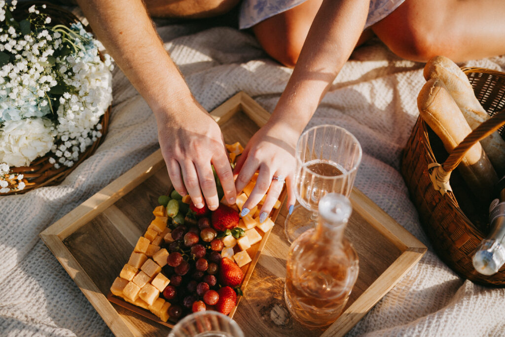 Hailey and Tanner sharing a quiet moment during their engagement-session picnic
